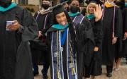 Students are excited to walk over the seal on Kaufman Mall, a tradition that has not happened since 2019. Photo Chuck Thomas/ODU